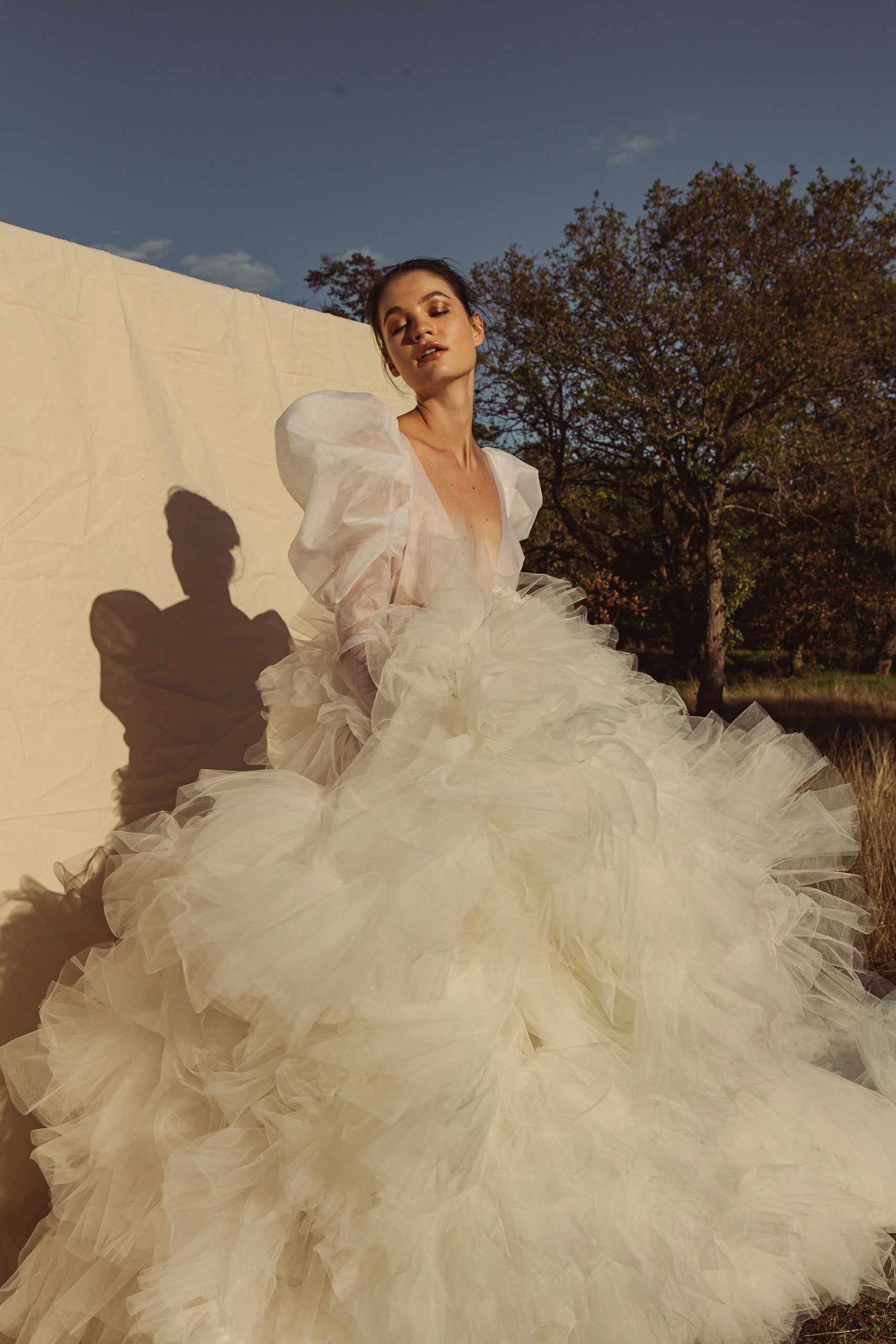 Gabrielle Long Puff Sleeve & Silk Flower Ruffle Gown.