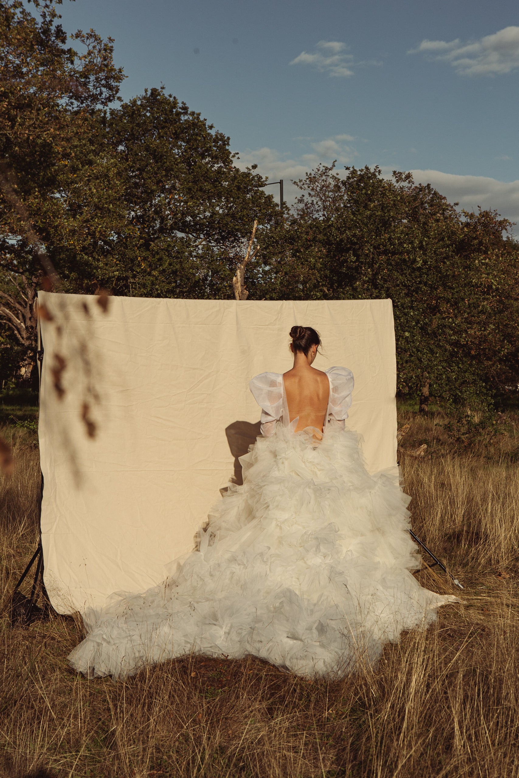 Gabrielle Long Puff Sleeve & Silk Flower Ruffle Gown.